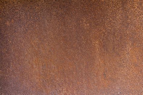 Premium Photo | Brown metal background texture, metal steel vintage plate with some old scratch