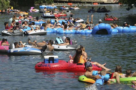 Comal River tubing outfitter temporarily closing due to rise in coronavirus cases