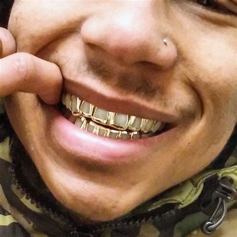 Pin by Shamiek-Ali Artis on clotbhign styles | Grillz teeth, Grillz ...