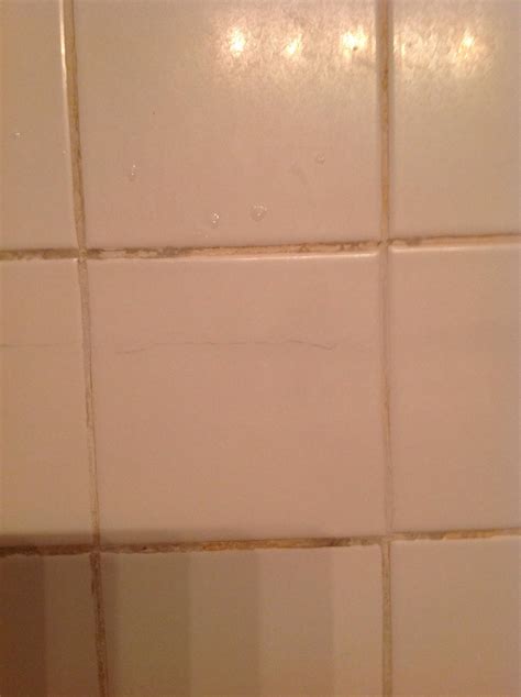 repair - Cracked bathroom tile - runs almost entire length of the wall - Home Improvement Stack ...