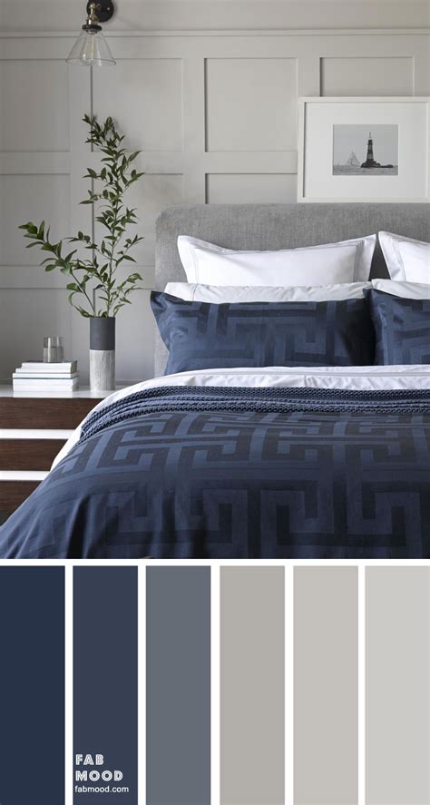 Grey and dark blue color scheme for bedroom