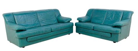 210: TEAL LEATHER SOFA AND LOVESEAT