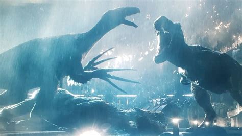 two dinosaurs fighting in the rain with each other