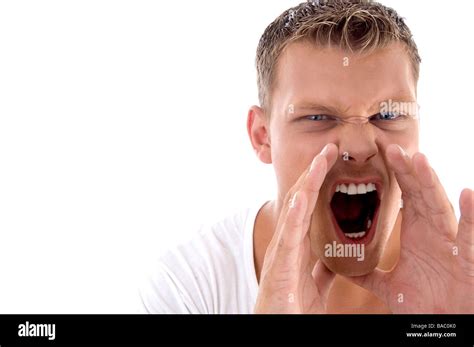 young fellow shouting loudly Stock Photo - Alamy