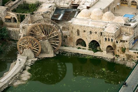 Norias on the Orontes River in Hama, Syria | Ancient cities, Water ...