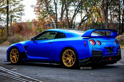 Outstanding Blue Nissan GT-R with Custom Vented Hood and Gold Rims ...