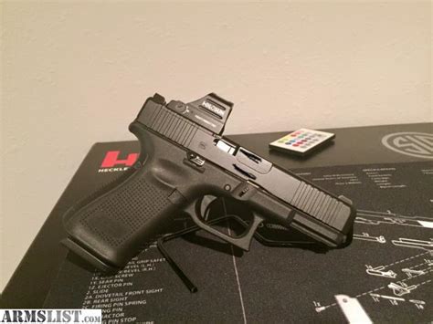 ARMSLIST - For Sale/Trade: Glock 19 gen 5 mos w holosun 507c