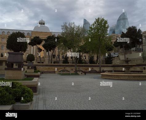 Historic Buildings in the Old Town of Baku with Flame Towers Skyscrapers Backdrop, Azerbaijan ...