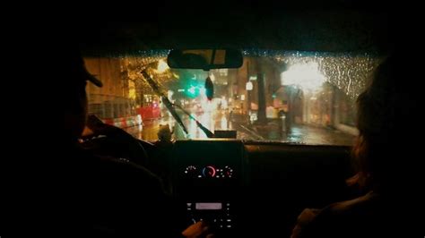 Premium Photo | Rear view of people traveling in car at night during ...