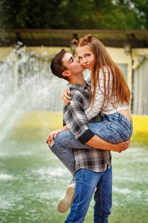 Enamoured Teenagers Big Hug. Stock Image - Image of lifestyle, activity: 76268293