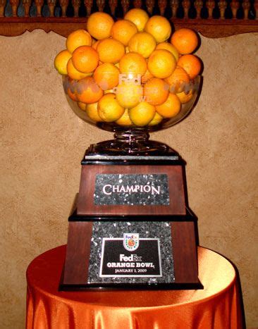 FedEx Orange Bowl Trophy..#bling AND a snack! Now that's what we call ...