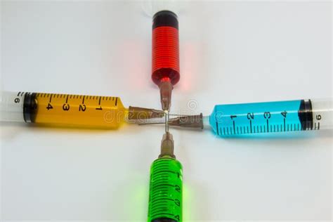 Plastic Medical Syringes Containing Multicolor Solutions with White ...