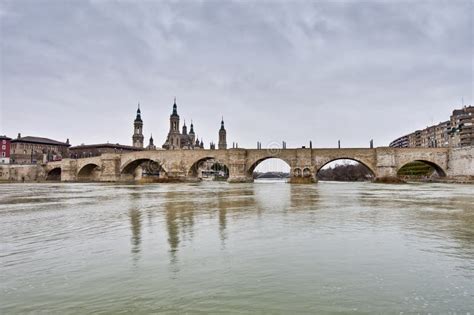 Stone Bridge and Ebro River at Zaragoza, Spain Stock Photo - Image of reflection, daylight: 23868122