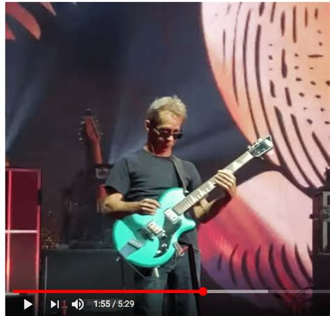 Anyone know the brand of guitar that Tim is playing in the photo? : r/DMB