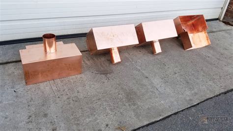 Custom copper scupper boxes with outlets