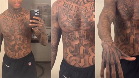 IN PHOTOS: Sauce Gardner shows off stunning torso tattoo ahead of Jets' training camp