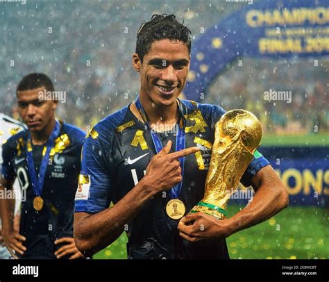 Raphael varane world cup trophy hi-res stock photography and images - Alamy
