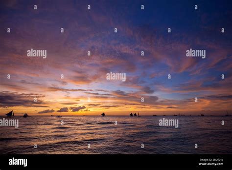 White beach sunset on Boracay island, Philippines Stock Photo - Alamy