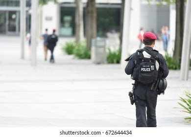 117 Singapore Police Uniform Images, Stock Photos & Vectors | Shutterstock