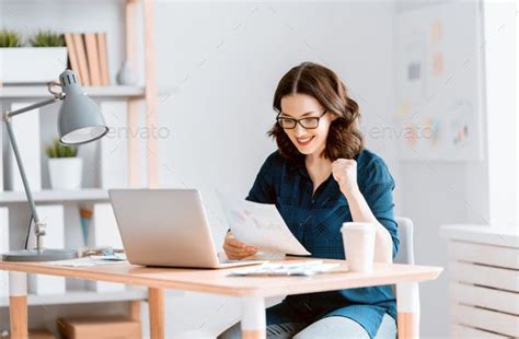 woman working on a laptop at home. | Social media jobs, Women, Work