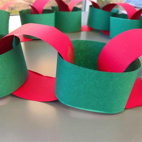 Simple festive paper chain decorations | Paper chains, Christmas paper ...