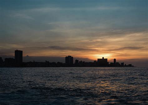 Malecon Sunset Photograph by Tran Boelsterli - Fine Art America