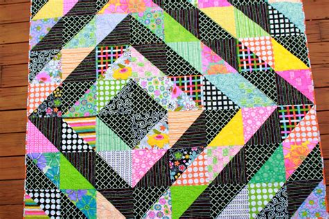 Girls in the Garden: Black Quilt with Bright Fabrics