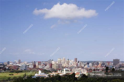 Clouds over Durban city skyline, South Africa, Africa — highrises, copy space - Stock Photo ...