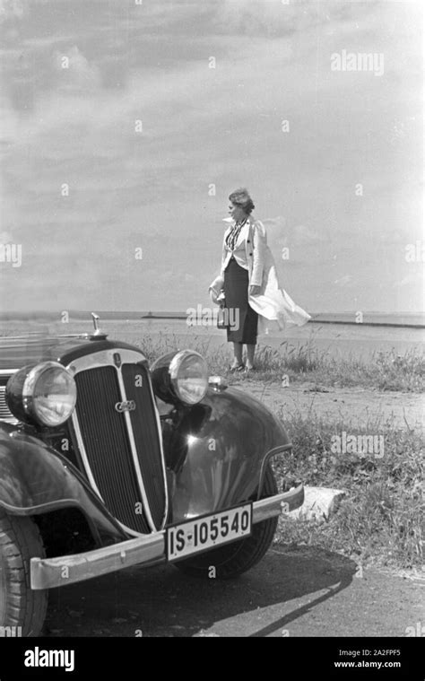 1930s woman car Black and White Stock Photos & Images - Alamy