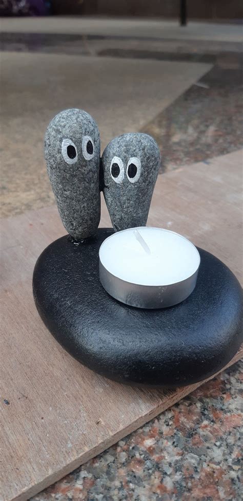 Stone candle | Stone candle holder, Stone candles, Rock candle holder