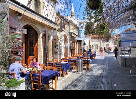 Old town street with restaurant tables Limassol, Bay of Akrotiri, Mediterranean Sea, Cyprus ...