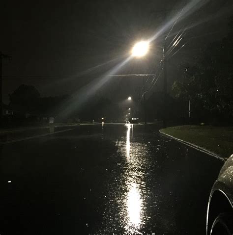 A rainy street at night. : r/raining