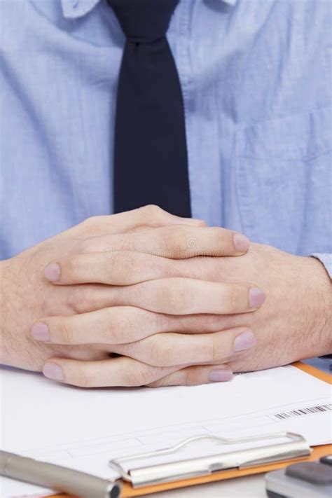 Businessman Folded Hands on Table Stock Photo - Image of paperwork, business: 134327110