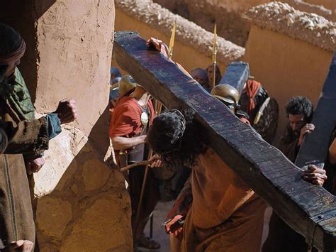 Free Bible images of Jesus being flogged, carrying the cross and being taken out of the city to ...