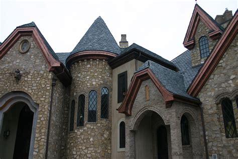 Castle style home using natural stone on the exterior | Beehive Brick & Stone | Castle style ...