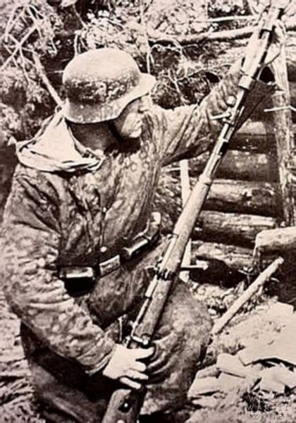 World War II History: A rare photo of a Waffen SS solider preparing to ...