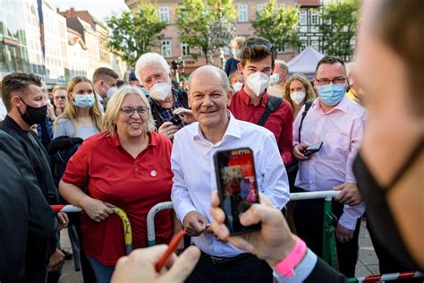 Boosted by surge in polls, Germany's Scholz bets on coalition with Greens | Reuters