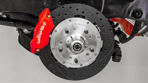 Does disc brake caliper mounting location on the rotor matter?