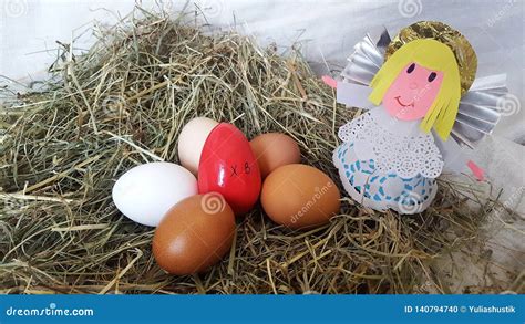 Eggs for Easter and a Paper Figure of an Angel Stock Photo - Image of ...