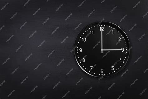 Premium Photo | Wall clock showing three o'clock on black chalkboard background office clock ...