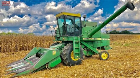 JOHN DEERE 4420 Combine Harvesting Corn