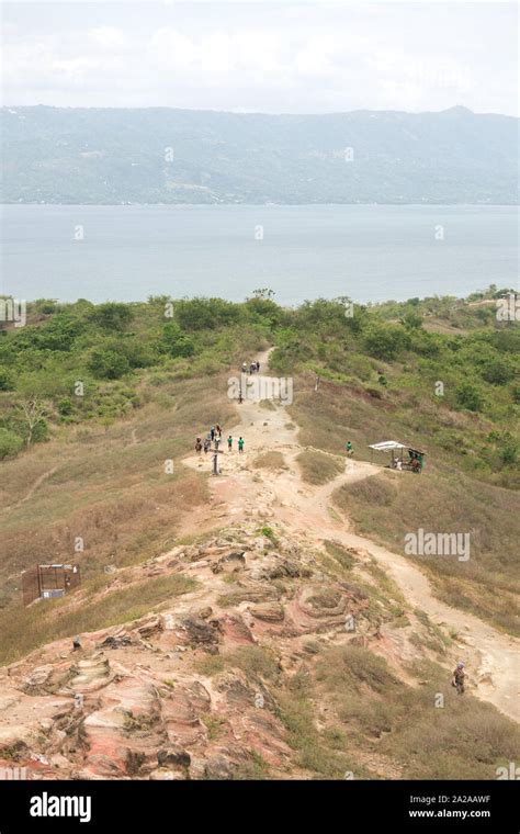 Tourists walking hiking trekking tour trail to Taal volcano, Batangas ...