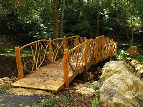 Rustic Wooden Footbridge | Sloped backyard, Backyard bridges, Cedar garden bridge