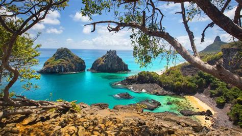 Two Brothers rock formation at Baía dos Porcos beach, Fernando de ...