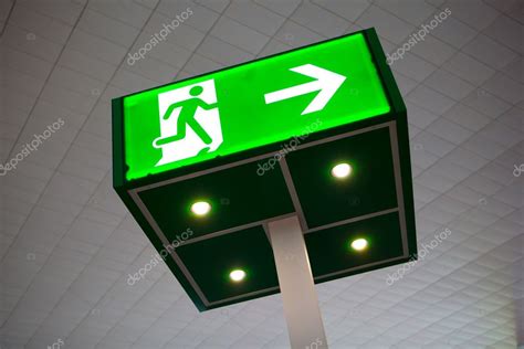 Green emergency exit sign Stock Photo by ©nikkytok 10237000