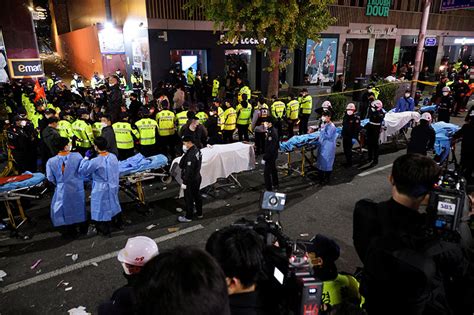 Halloween stampede in Seoul leaves at least 149 dead