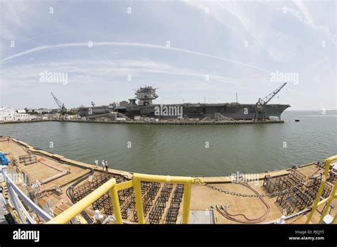 NEWPORT NEWS, Va. (July 15, 2018) -- USS Enterprise (CVN 65) sits ...