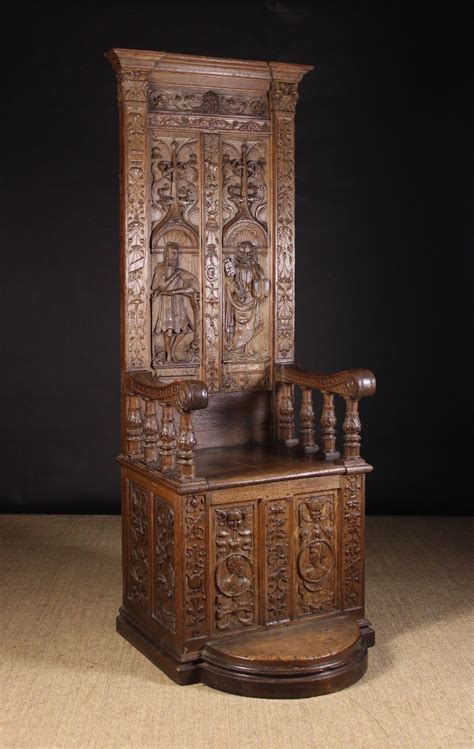 A Carved 16th Century Renaissance Throne Chair. The tall twin ...