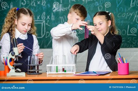 Chemistry Science. Little Kids Scientist Earning Chemistry in School Lab. Biology Experiments ...