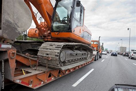 Heavy Equipment Transport Stock Photo | Adobe Stock